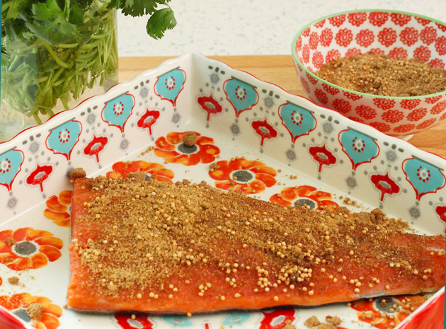 pat-spices-on-fish Spice-Rubbed Salmon Recipe | Pretty Handy Girl