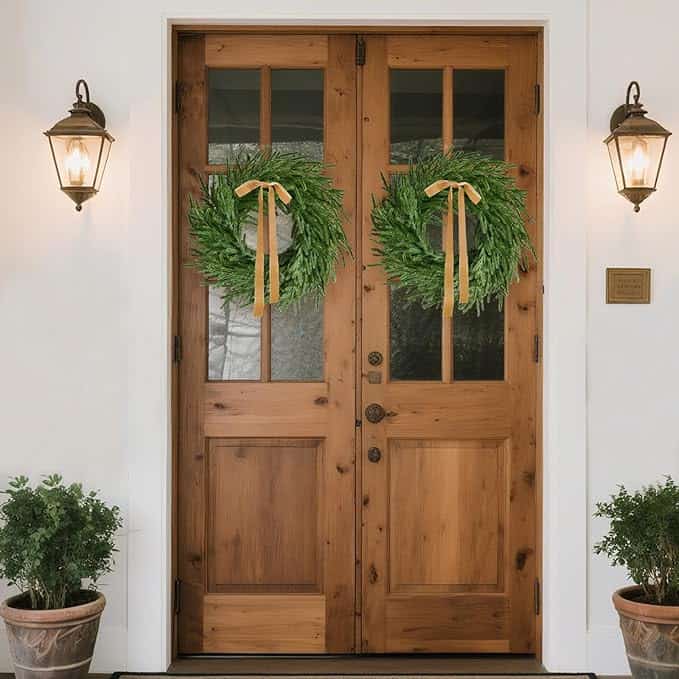 budget friendly holiday decor, set of 2 norfolk pine wreaths shown on front doors