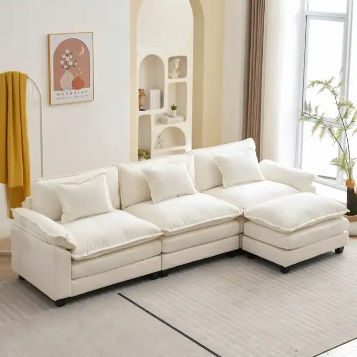 comfy white sectional with ottoman - neutral home decor